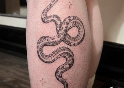 Black and gray snake tattoo by Alexa - Killer Silver Tattoo