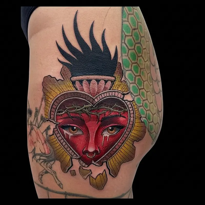 Sacred heart tattoo with crown of thorns by guest artist Bence Kormos at Killer Silver Tattoo Studio