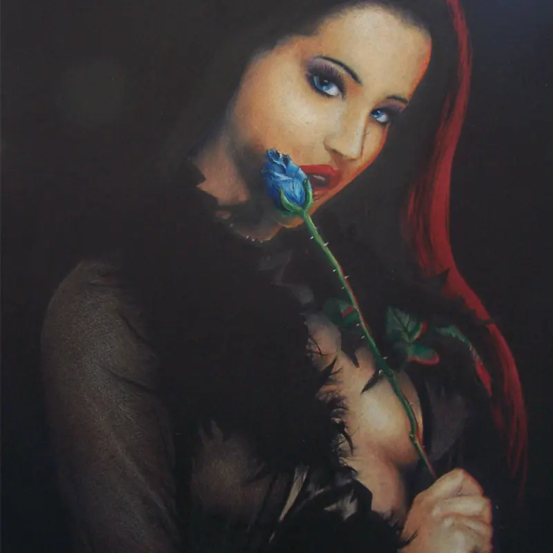 Color portrait of a woman with a blue rose by Caesar, Killer Silver Tattoo Studio - color pencil on black paper.