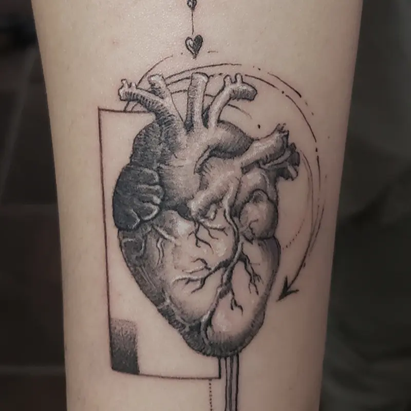 Fine-line dark art tattoo of an anatomical heart with geometric elements, by Philipus