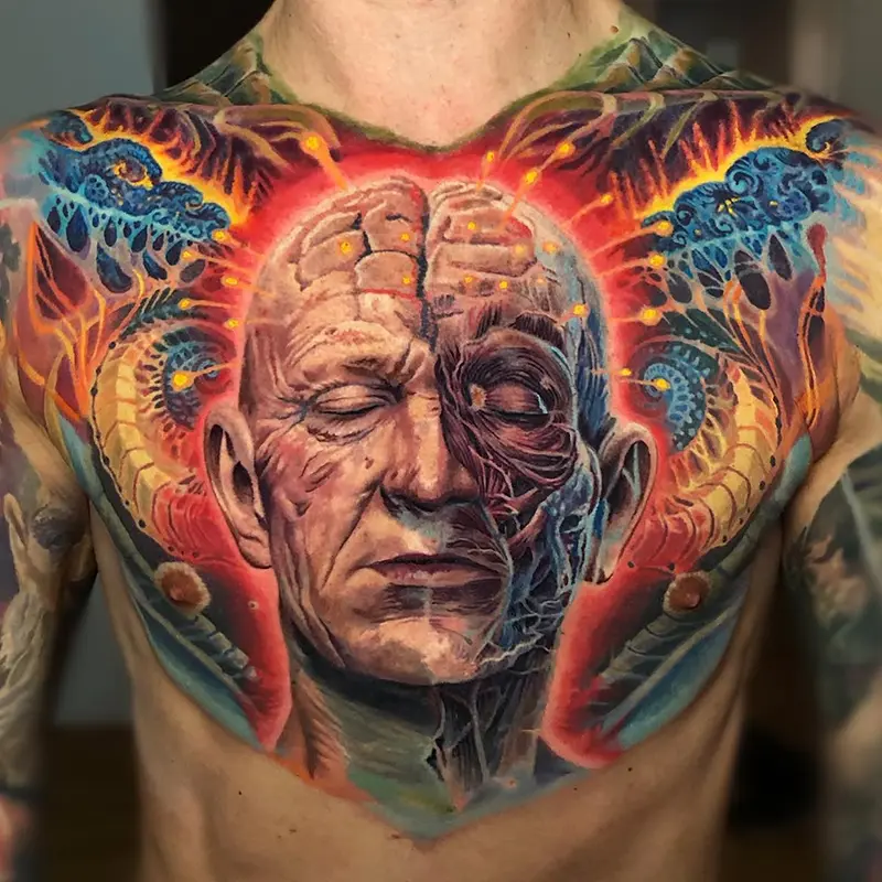 Surreal anatomical portrait chest tattoo by guest artist Soma Kiraly at Killer Silver Tattoo Studio