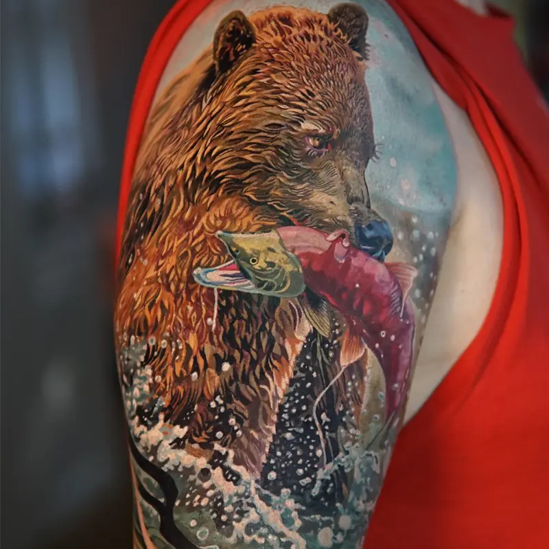 Color realism bear catching salmon tattoo by guest artist Soma Kiraly at Killer Silver Tattoo Studio