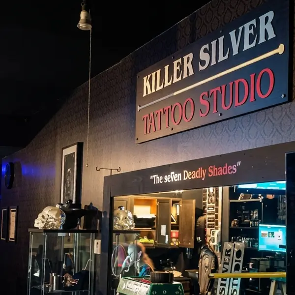 Killer Silver Tattoo Studio sign and Se7en Deadly Shades display at 172 Avenue B in the East Village