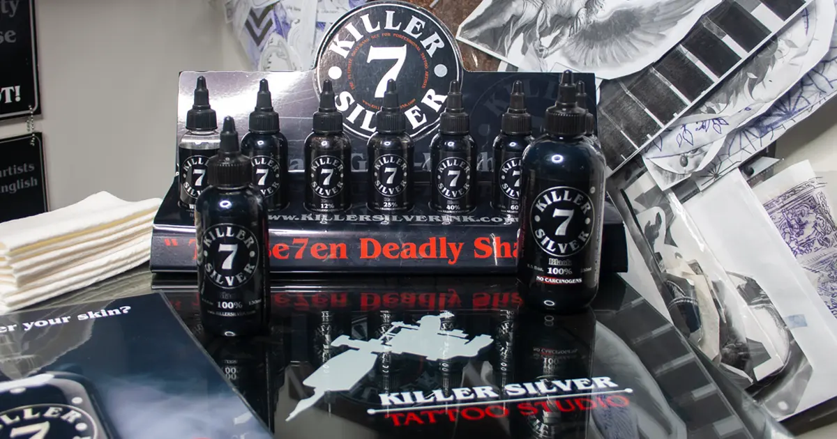 Killer Silver Se7en Deadly Shades tattoo ink bottles on display at Killer Silver Tattoo Studio in Scarsdale, NY